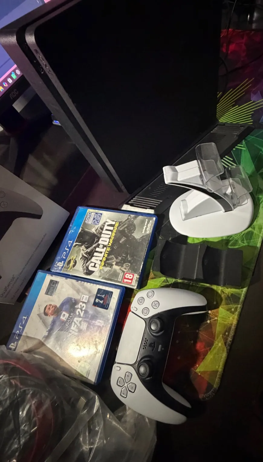 PS4 Slim 1TB + يد PS5 + ألعاب وملحقات — صورة 9